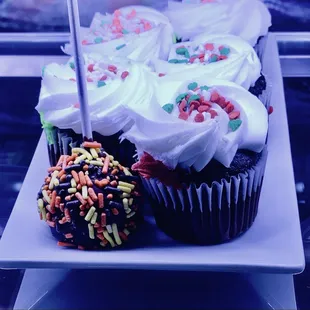 Amazing desert case with cupcakes etc