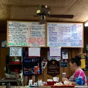 a woman sitting at the counter