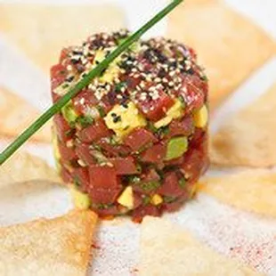 Asian Ahi Tuna Tartare is one of many delectable bar bites featured on our Bar 79 menu