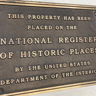 a plaque of the national register of historic places