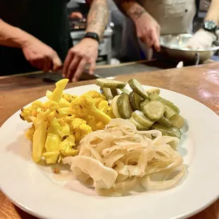 Plate of Pickles (shaved fennel, dill pickles, and curried cauliflower).