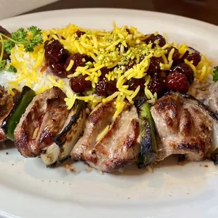 Lamb Kabob with rice topped with cherries