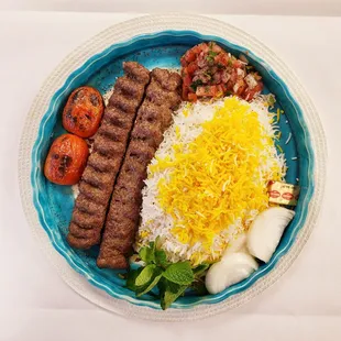 Jelo kabobs kobideh  , saffron rice with beef kebab and barbecue tomato