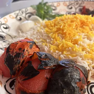 Buttery saffron rice, grilled tomato