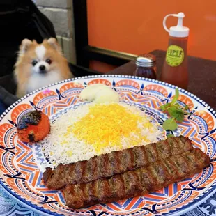 Cholo Kebab Koobideh: Two Ground Beef Kabobs w/ rice, tomato, white onions, mint | $18.99