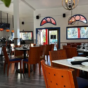 tables and chairs in a restaurant