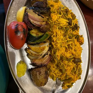 Vegetarian kebab super delicious. It's fine dining so super expensive but this is the plate size WOW.  Vegetable Kebab with Rice Dinner