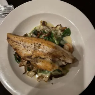 Daily Fresh Catch (Chilean Sea Bass) served with a medley of vegetables