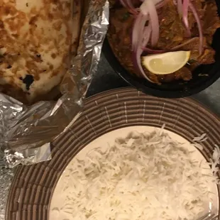 Goat Pepper Fry, side of rice, and Garlic Naan