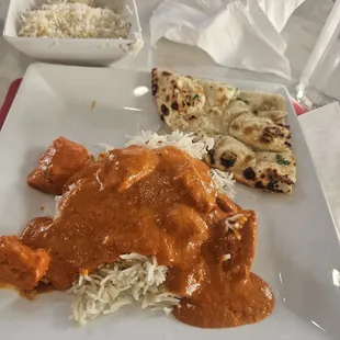 Boneless Butter Chicken and Lamb Masala with garlic Nana bread