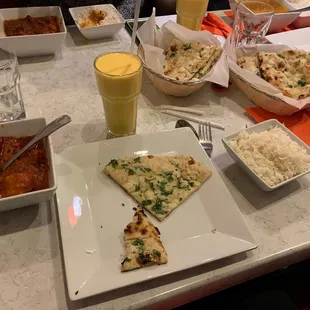 Chicken Korma, mango lassi, and Garlic Naan