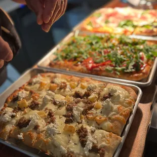 Sausage pizza, salumi pizza, prosciutto pizza