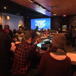 people sitting at a bar