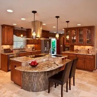 a large kitchen with a center island