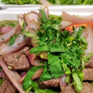 Tallarin verde con lomo saltado