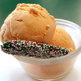 a bowl of ice cream with sprinkles