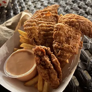 fried chicken and french fries with dipping sauce