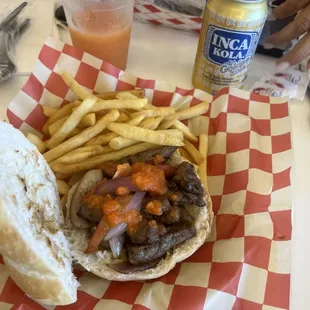 Lomo sandwich with fries and Inca Cola