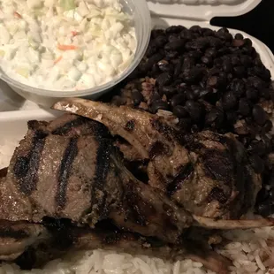 Grilled lamb chops, black beans over rice w a side of coleslaw