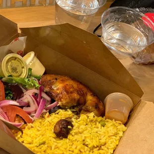 Quarter chicken, yellow rice and mixed salad with an order of flan o  the side