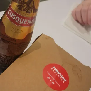 I bought a chicharron sandwich (pork) and a beer Cusqueña