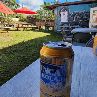 Inca Kola. Somewhere in the cream soda category but more mild.