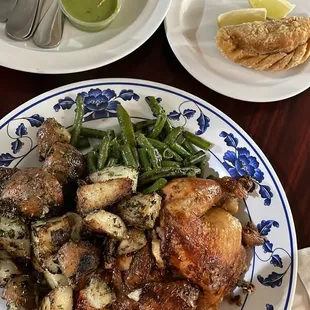 Half chicken with garlic potatoes and green beans + chicken empanada