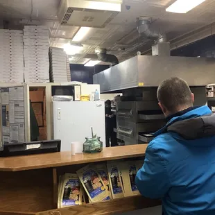 a man in a kitchen