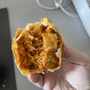 Interior of chicken empanadas. iPhone 12 Pro Max