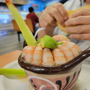 A dozen shrimp in their medium-sized cocktail.  Comes with tostadas and crackers.  A great deal for $12.