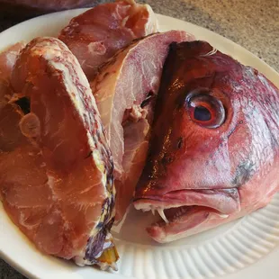 Part of the whole red snapper H bought.  ::binging fish head soup recipes::