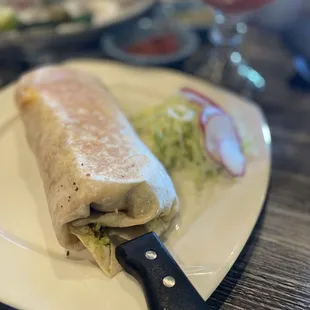 a burrito on a plate