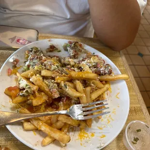 Asada nachos are delicious they come with sour cream, guacamole, and pico de gallon. It's a must try !