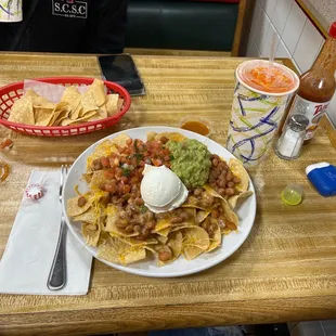 Nachos without meat, beverage is orange crush. Presentation is really amazing; the taste will amaze you, it's really fresh.