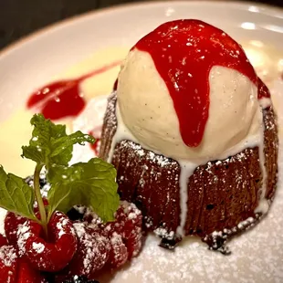 a dessert with ice cream and berries