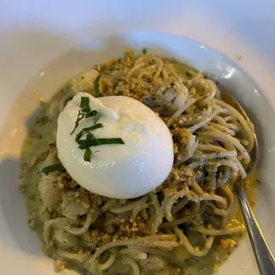 Spaghetti with scallops and fresh burrata cheese.