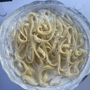 Fettuccine Alfredo: large portion, strong garlic flavor. Nice amount of sauce. Good