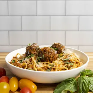 a bowl of spaghetti and meatballs