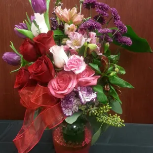 One of our fabulous fresh flower arrangements oozing romance for Valentine's Day!