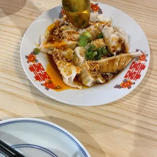 Spicy dumplings. So gas!