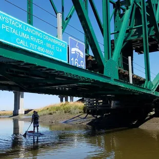 Under the Smart train bridge heading into town