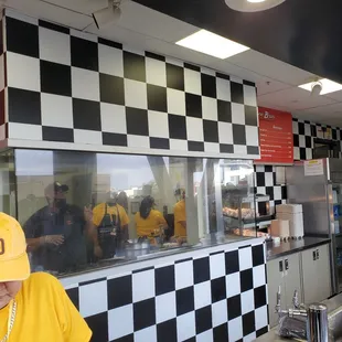 a man in a yellow hat