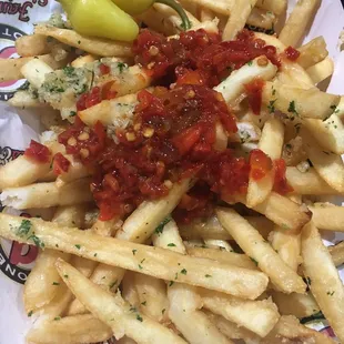 Garlic fries are a must. Try it with red chili! I promise you it's addicting.