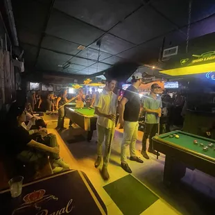 A game of pool despite the crowds