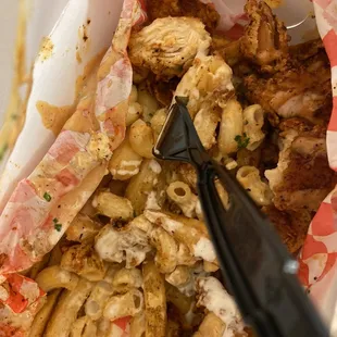 Fries with Mac n cheese and spicy chicken