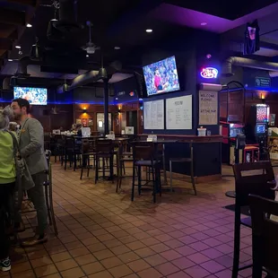 people sitting at the bar