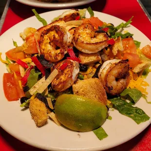 a plate of shrimp salad