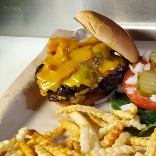 a cheeseburger and fries