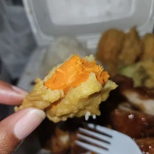 Under cooked yam tempura. Super hard and fibrous. Cut waaaay to thick