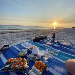 Got sushi to go for a beach picnic!